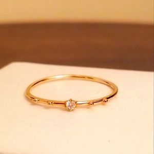 14K Dainty Diamond Ring. Size 7.5.